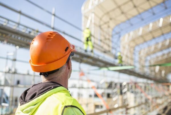man wearing hard hat in a construction zone