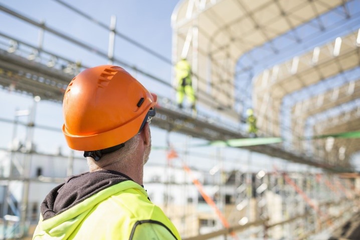 man wearing hard hat in a construction zone